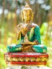 Kanakamuni Buddha out of brass, sitting with turquoise and coral, approx. 11,5 cm